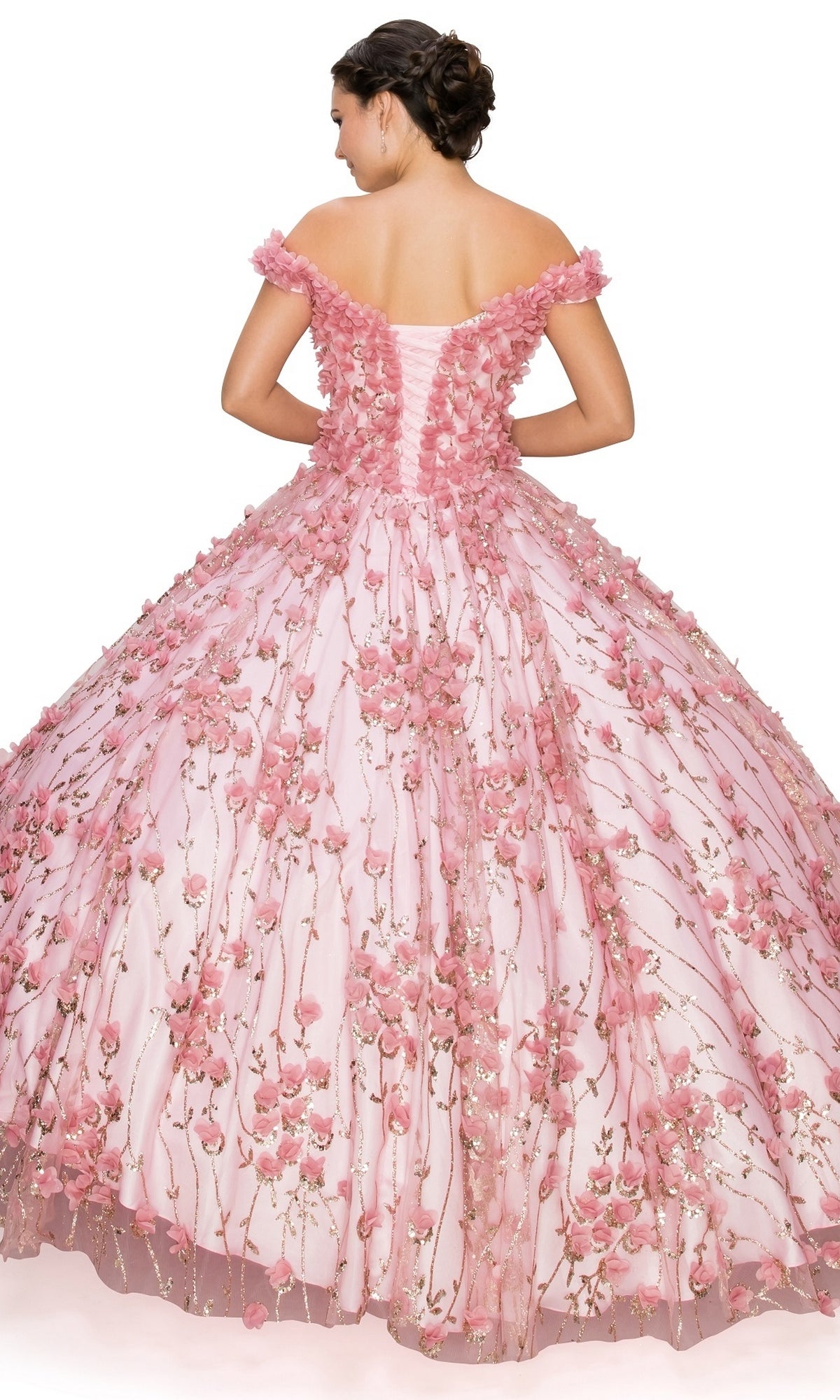 A woman shown from the back wearing the Quinceanera Ball Gown 8021J, featuring an off-the-shoulder design, lace-up corset bodice, and 3D floral details.